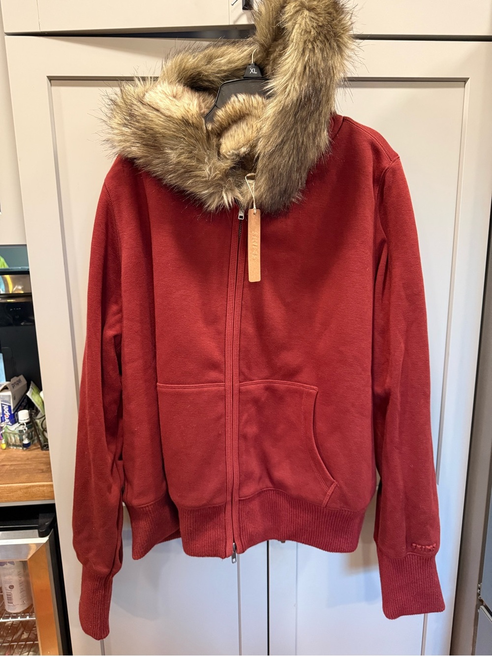 SKIMS Red Hooded Puffer Jacket with Faux-Fur Trim
